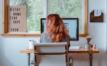 A woman using her coping skills she learned in therapy to avoid burnout while working from home