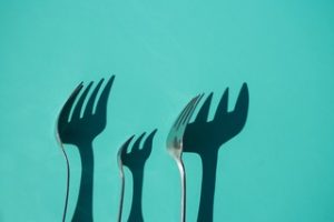 Three forks that represent the idea of being prepared for the week and maintaining a healthy bodyweight. Tips learned in body image group therapy in Katy, TX 77494